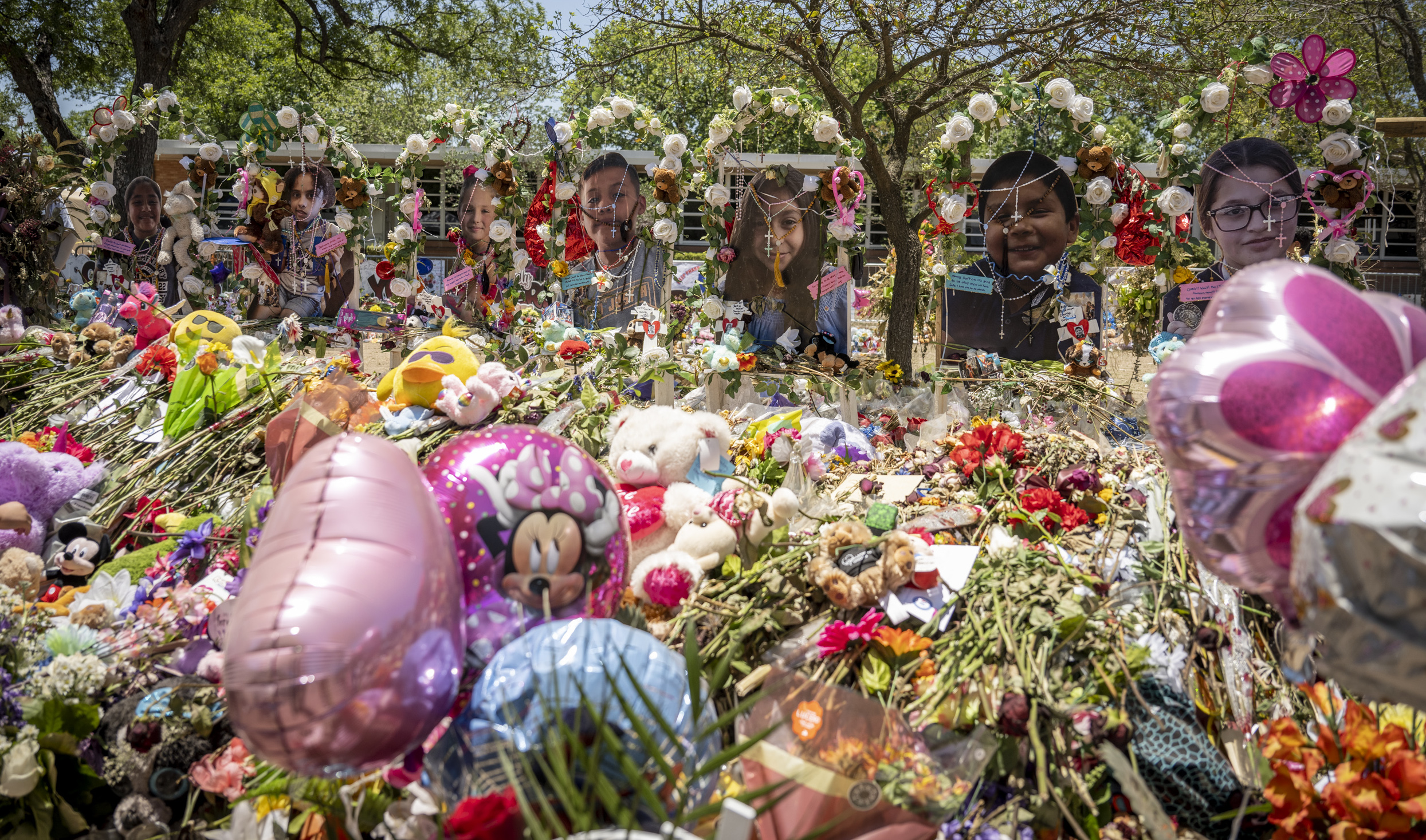 Uvalde, TX (June 6, 2022) DHS Secretary Alejandro Mayorkas visits Robb Elementary School, the site of a recent mass shooting where 21 people (19 students and 2 teachers) lost their lives. While there, the secretary laid a bouquet of flowers at the memorial site located at the school. (DHS Photo by Benjamin Applebaum)