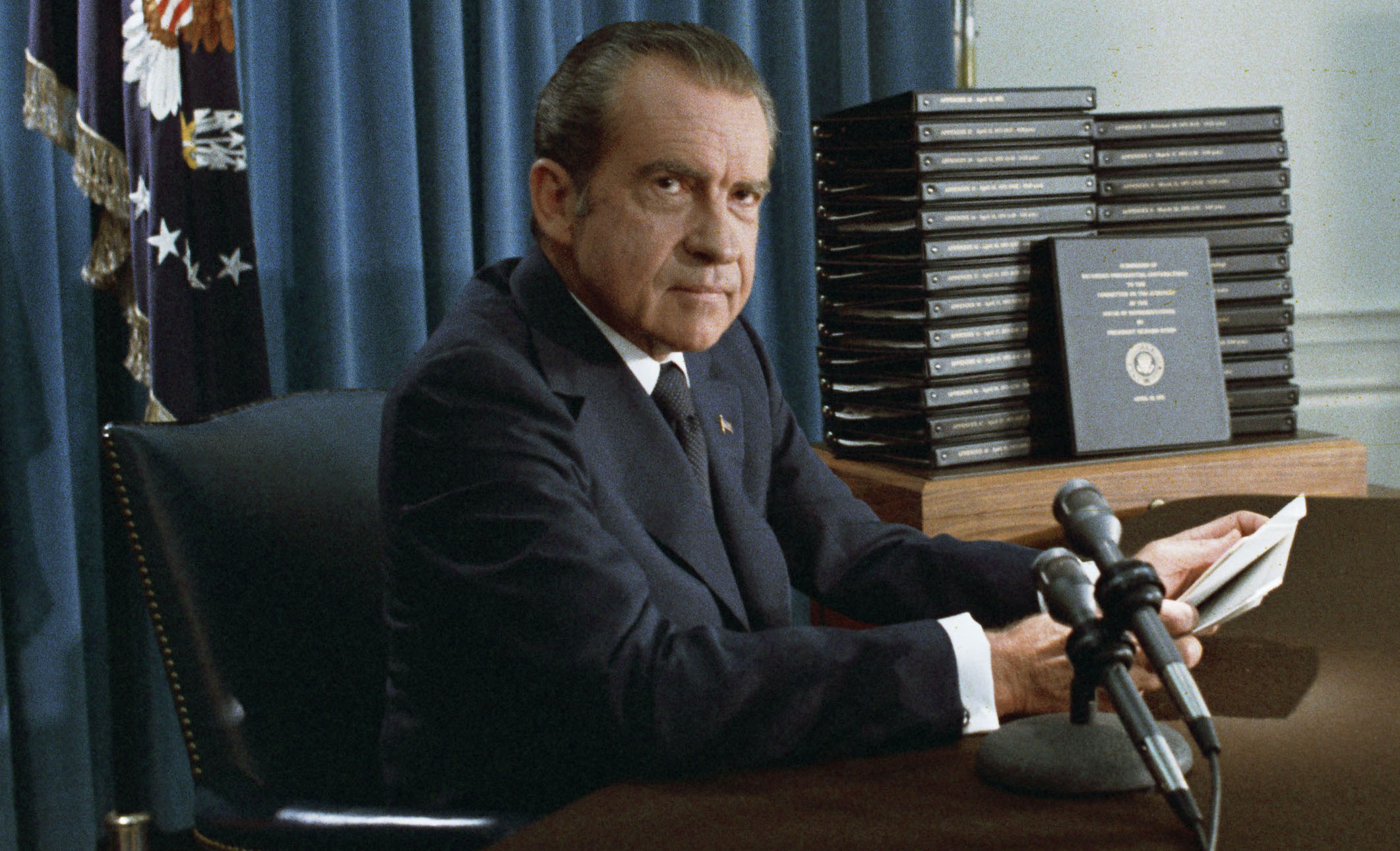 President Nixon with his edited transcripts of the White House Tapes subpoenaed by the Special Prosecutor, during his speech to the Nation on Watergate