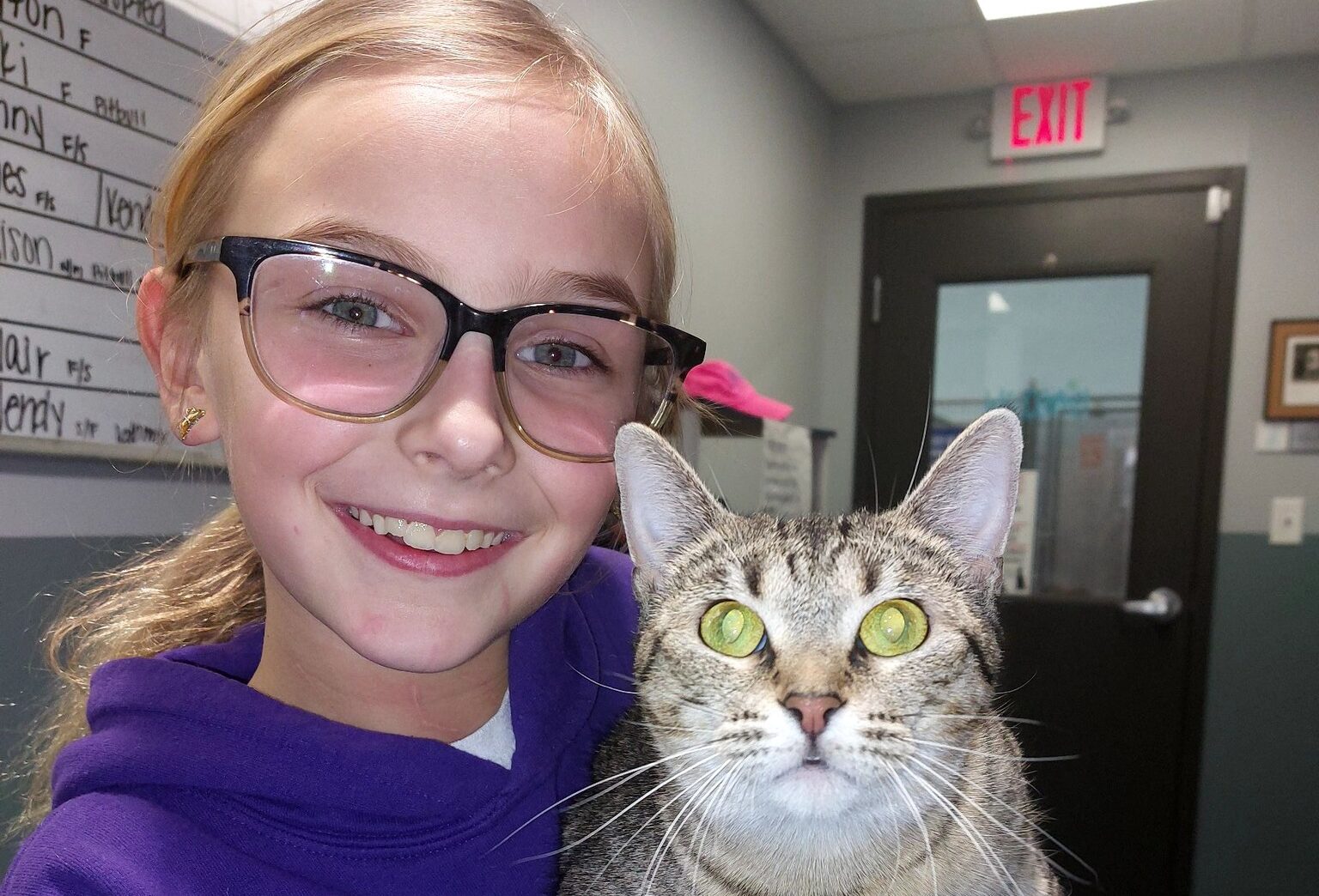 Maddi holds Sheila currently up for adoption at the Northeast Missouri Humane Shelter. She is a one-year-old domestic short hair and should not be kept with dogs.