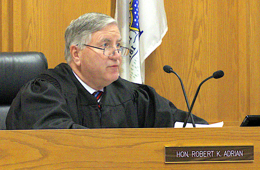 Judge Robert Adrian presides over the arraignment hearing of Timothy Bliefnick Friday in Quincy.