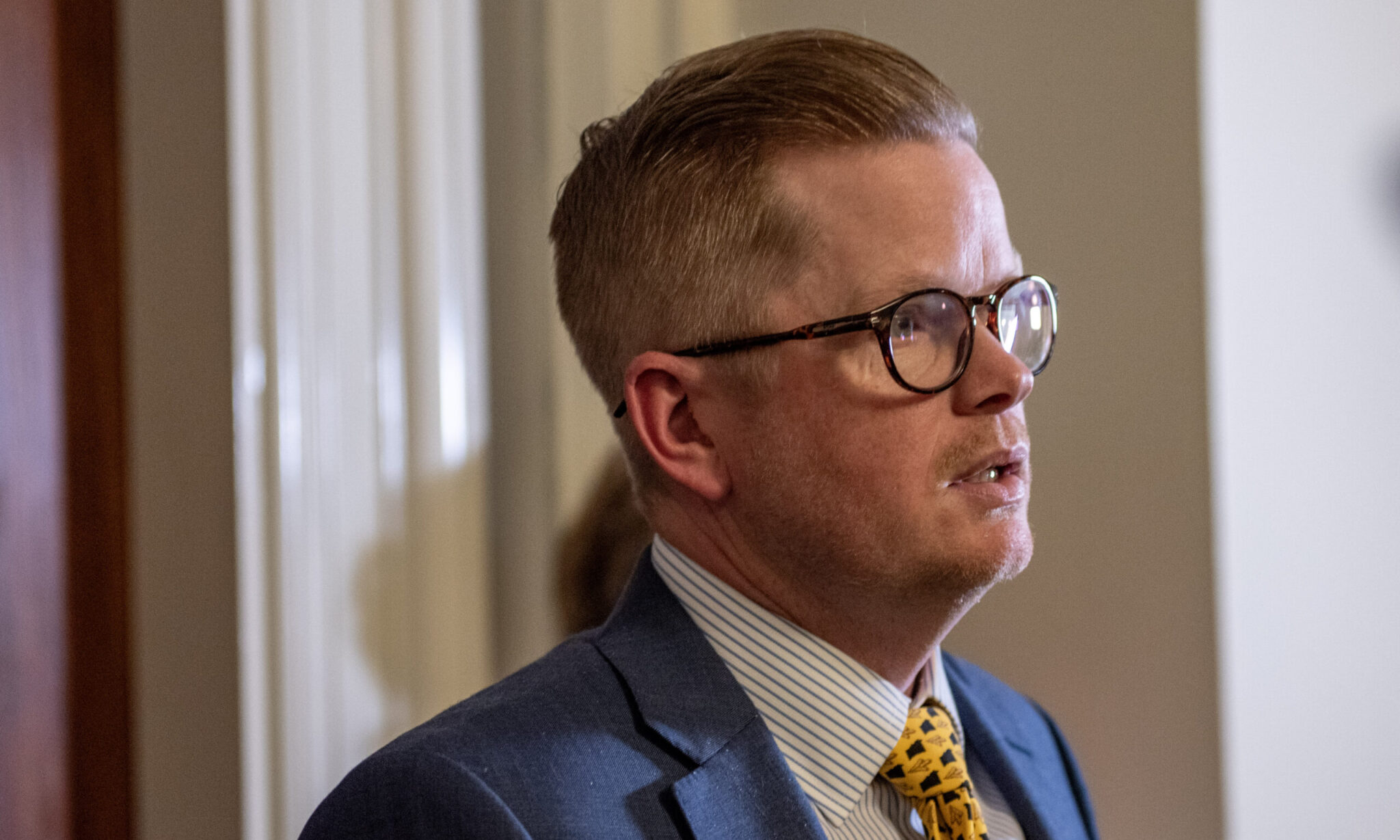 Missouri Senate President Pro Tem Caleb Rowden, R-Columbia, addresses reporters outside his office about the decision to remove Freedom Caucus members from their committee asssignments (Annelise Hanshaw/Missouri Independent).