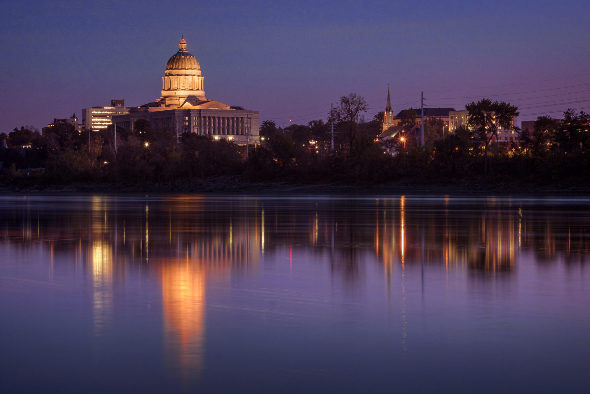 Missouri River, and Capitol Building during sunset in Jefferson City, Missouri.