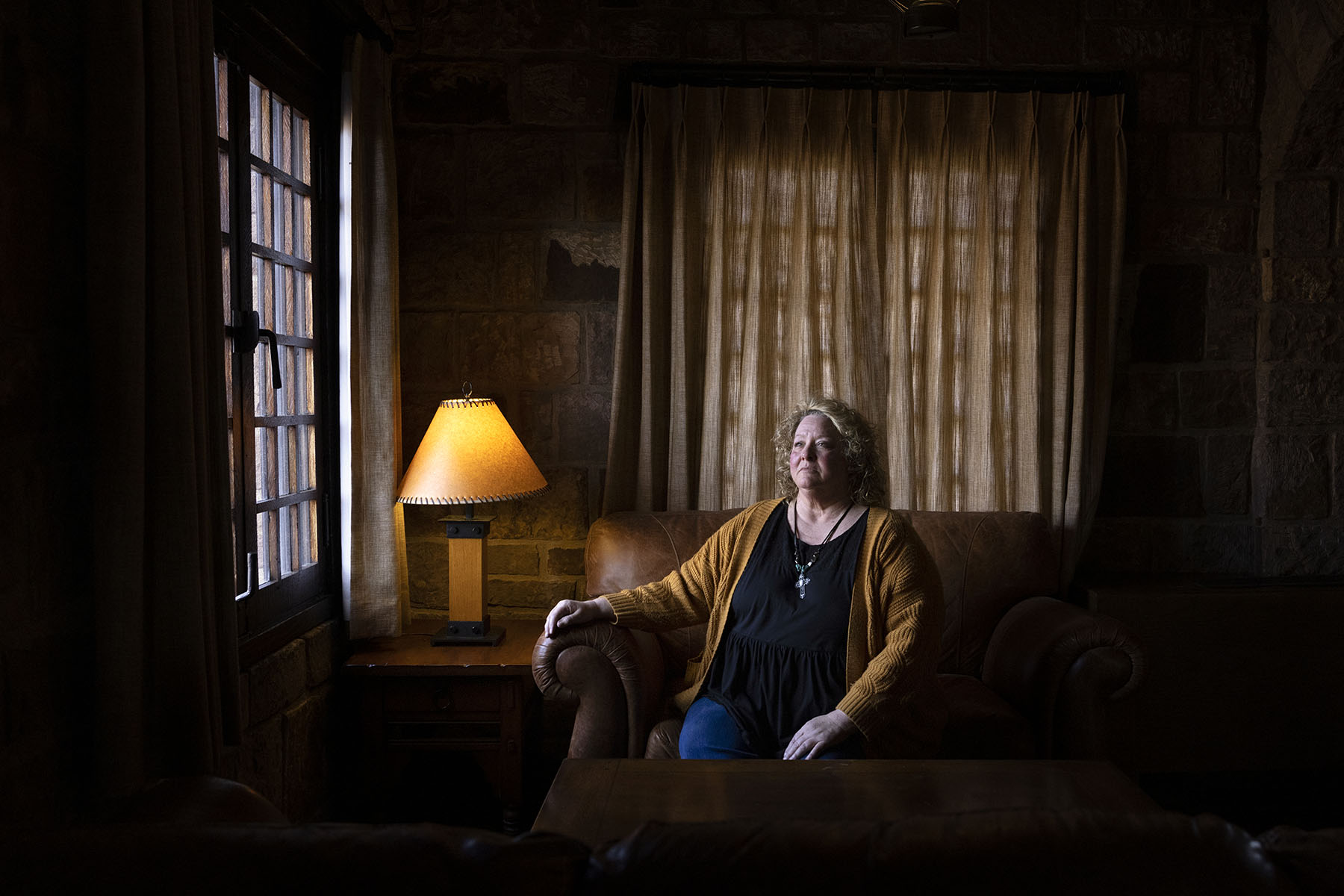Cheryl Thompson, 62, sits for a portrait near her home in Southern Illinois, in March 2024. Thompson said she was sexually assaulted on New Year’s Eve and was not offered a forensic exam at Union County Hospital in Anna, Illinois where she sought treatment. (JULIA RENDLEMAN FOR THE 19TH)