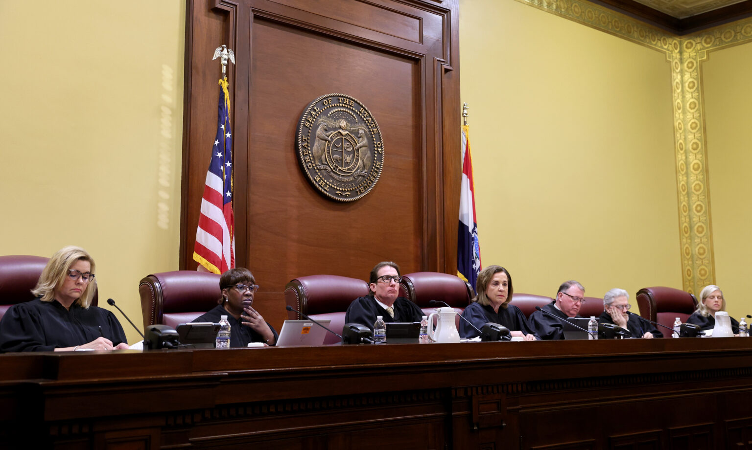 The Missouri Supreme Court takes the bench on Tuesday, Sept. 10, 2024 in Jefferson City to hear a case questioning whether an amendment to overturn the states abortion ban will remain on the states November ballot. From left are Judges Kelly C. Broniec, Robin Ransom, W. Brent Powell, Chief Justice Mary R. Russell, Zel. M. Fischer, Paul C. Wilson and Ginger K. Gooch.