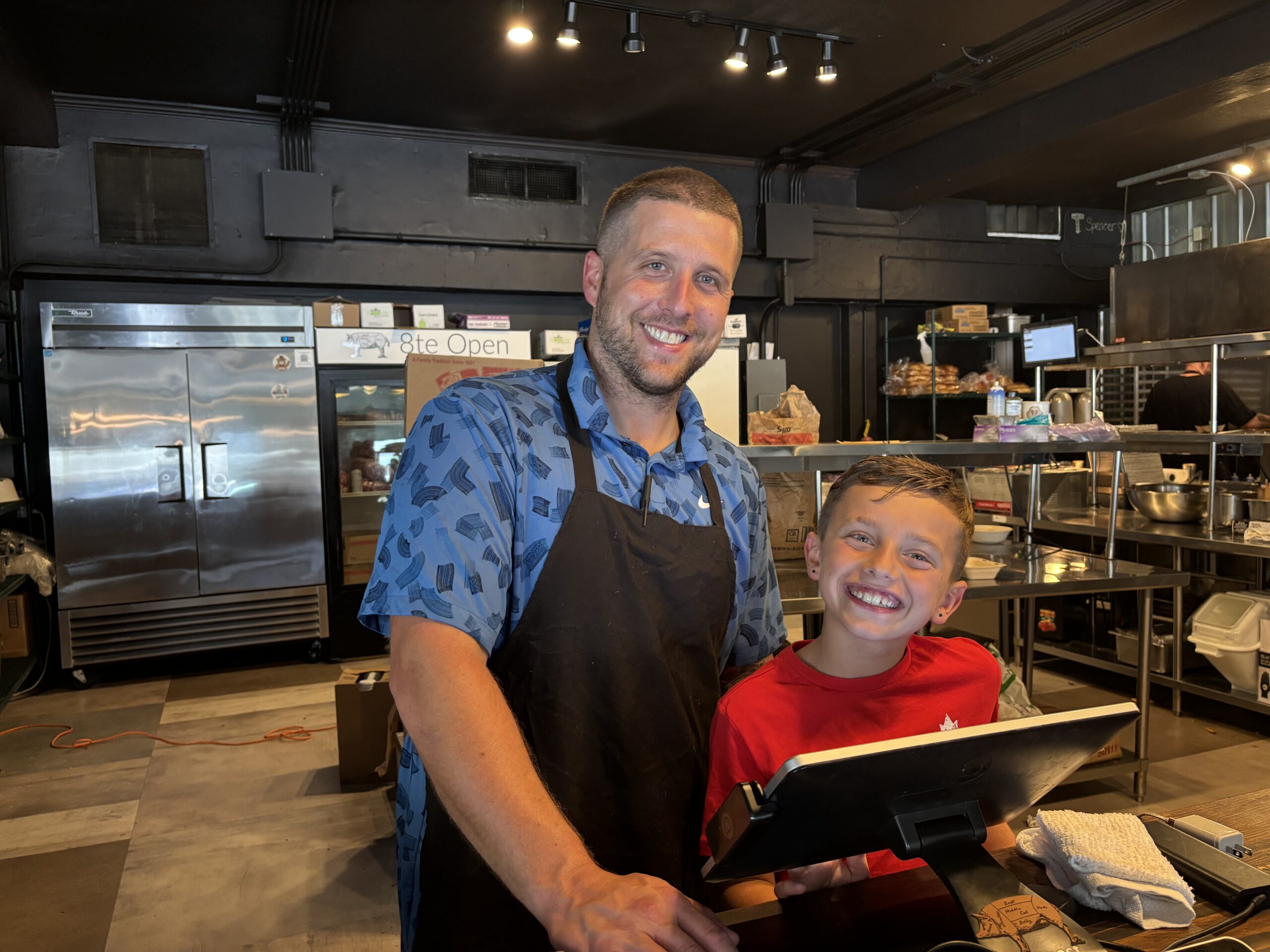 IMG_4717 Jared and Washington Tipton working the register, Washington's favorite job at 8te Open